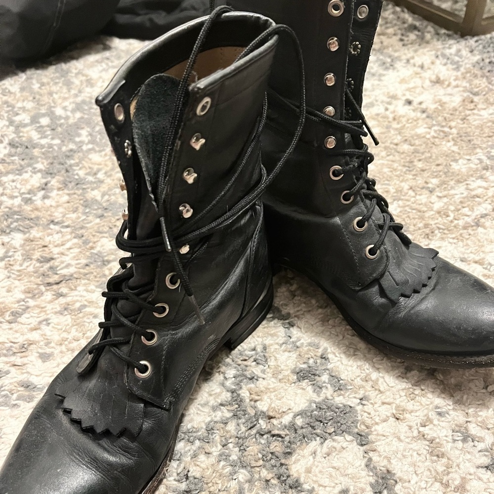 Justin’s boots. Slim line, with Frey on toe tip.